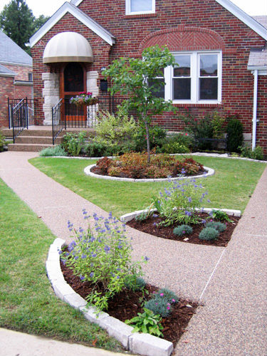 South County frontyard with plantings and stone edging